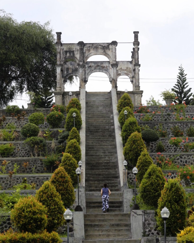 walking up steps in taman ujung bali